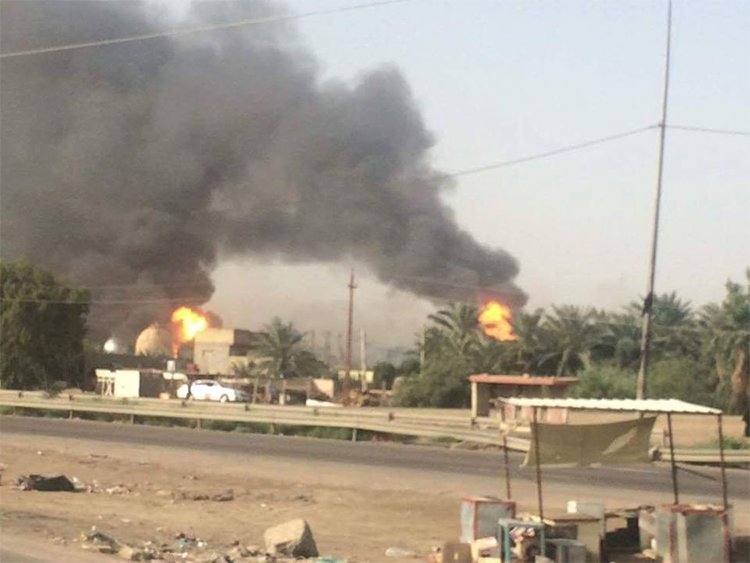 صور تفجير معمل غاز التاجي من قبل عصابة داعش الأجرامية (2)
