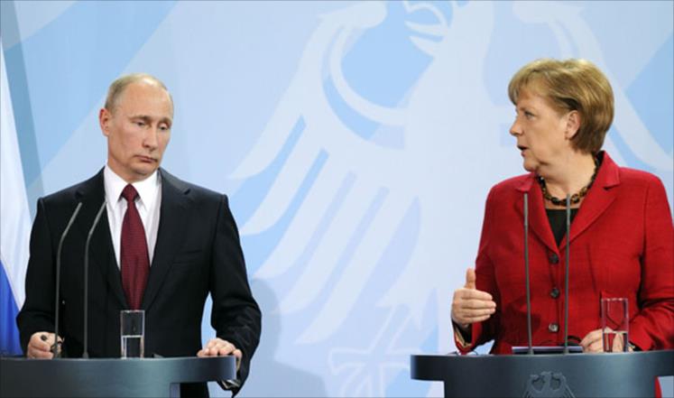 المستشارة الالمانية ميركل والرئيس الروسي بوتين (ارشيفية)