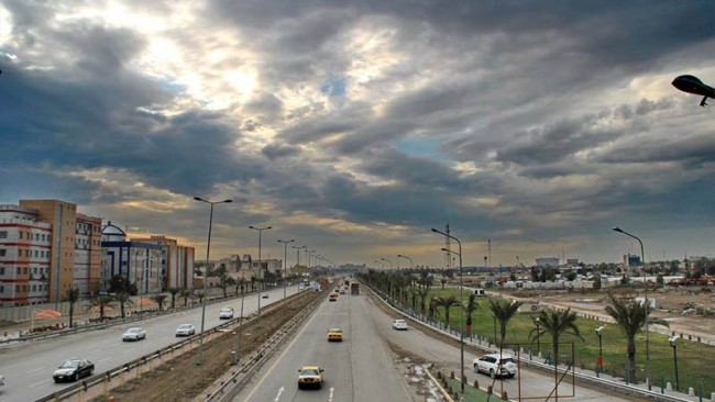 صورة التقطاً حديثا في أحد شوارع العاصمة بغداد، وتظهر السماء غائمة